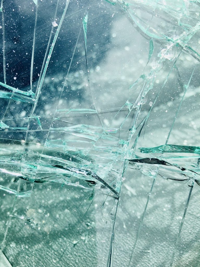 close up car window smash